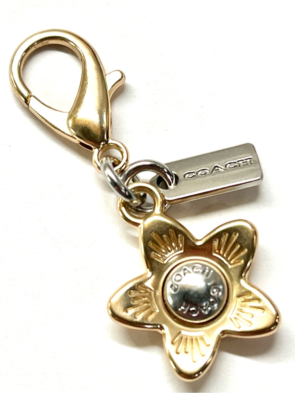 Coach Silvertone Flower Bag Charm
EUC